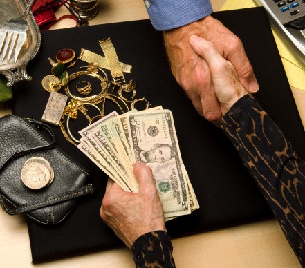 woman selling gold and silver